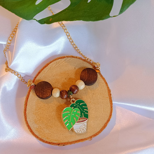 COLLANA SEMIRIGIDA CON MONSTERA